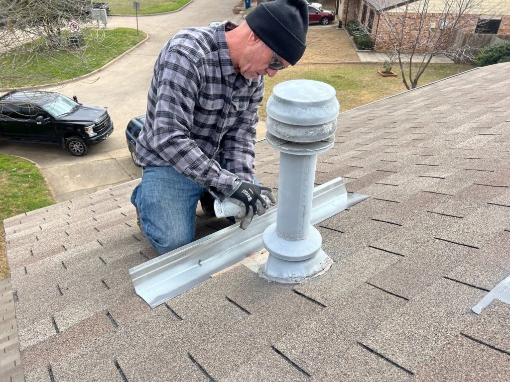 Tad repairing the roof.